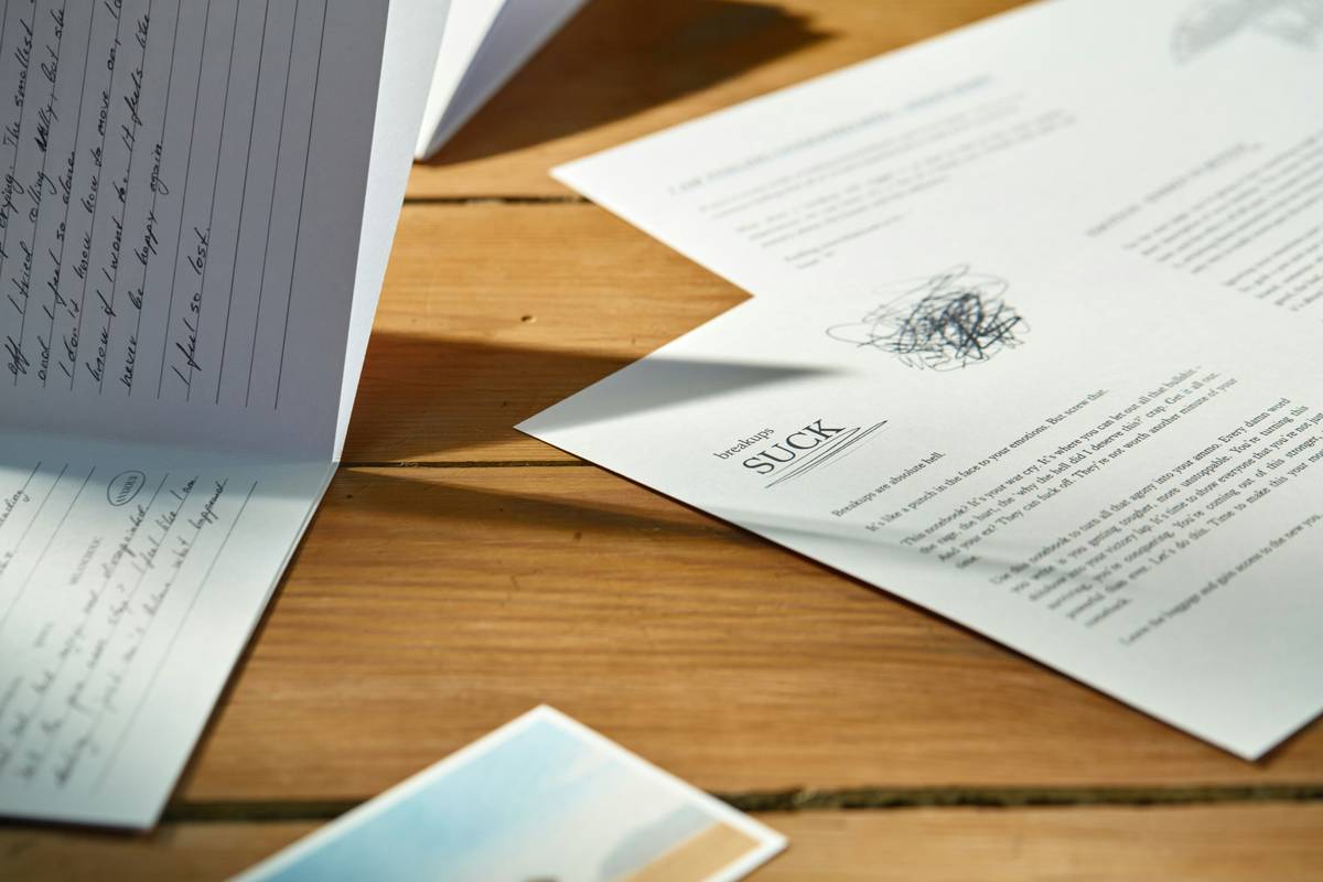 Close-up image of someone examining detailed insurance documents