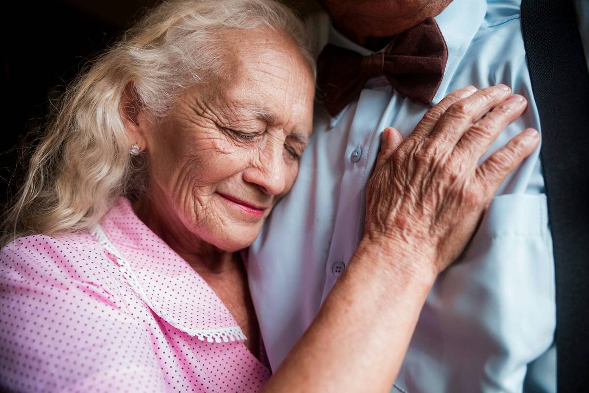 A man and a woman embracing each other