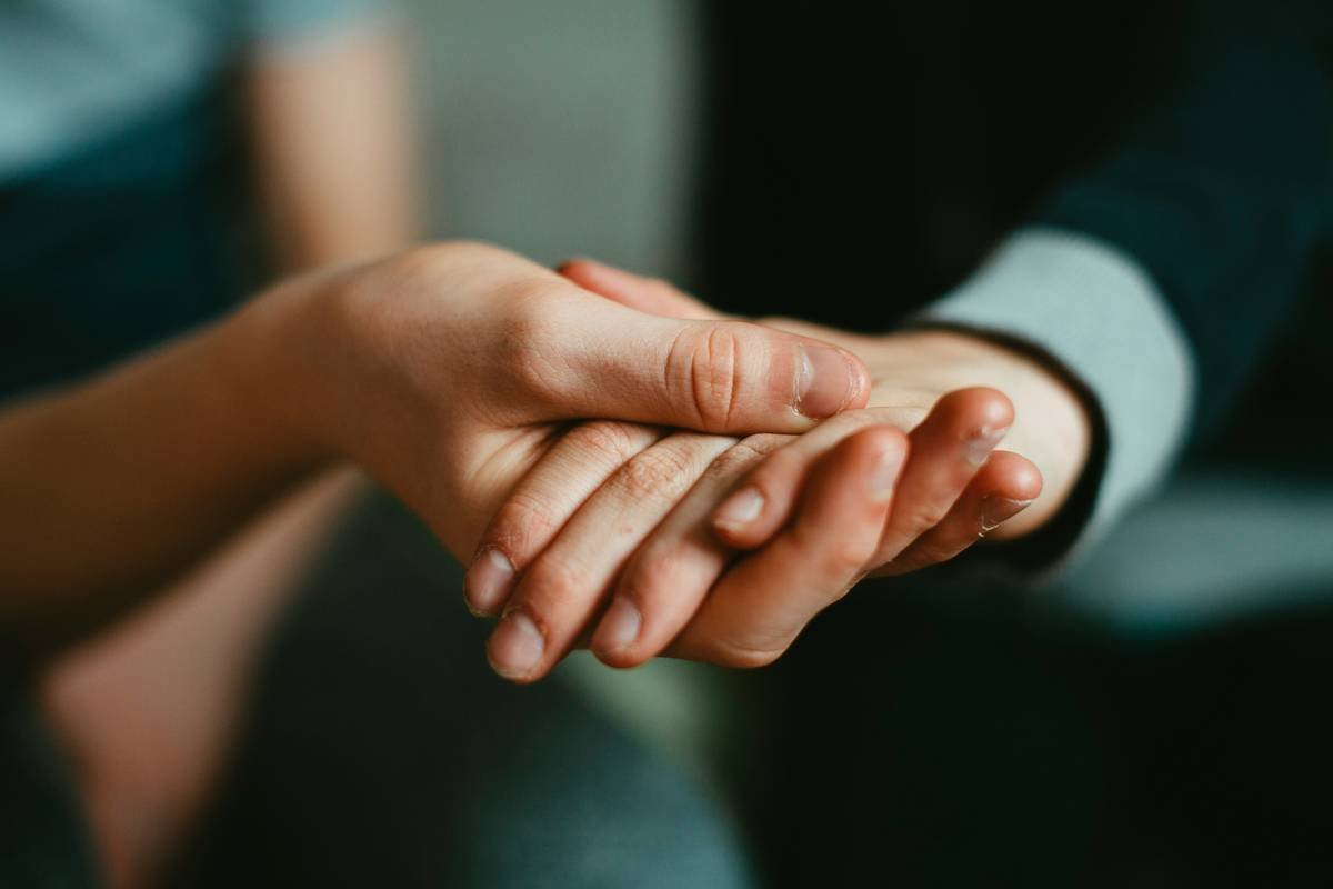 Helping and protective hands – two boyfriends